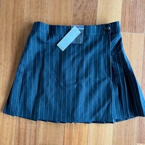 Pin stripped skirt , pleats in back